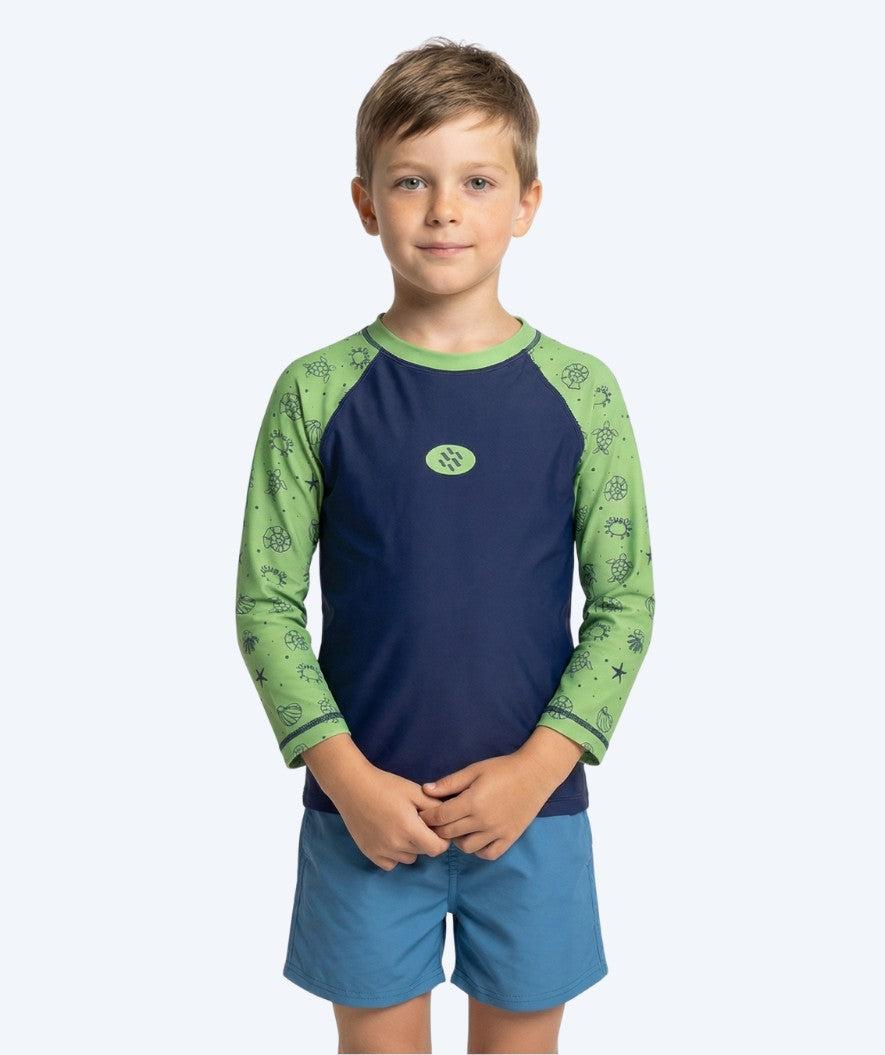 Watery UV-rashguard för barn med lång ärm i grön och blå brandmansmönster
